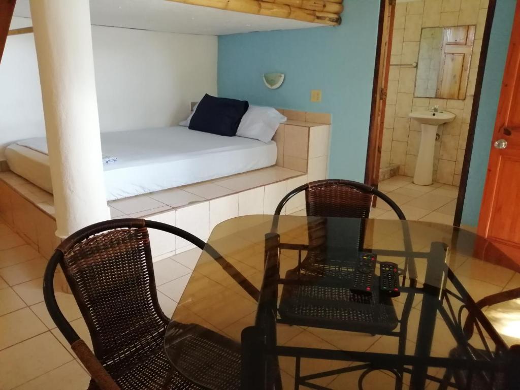 Postel nebo postele na pokoji v ubytování Boca Brava Lodge