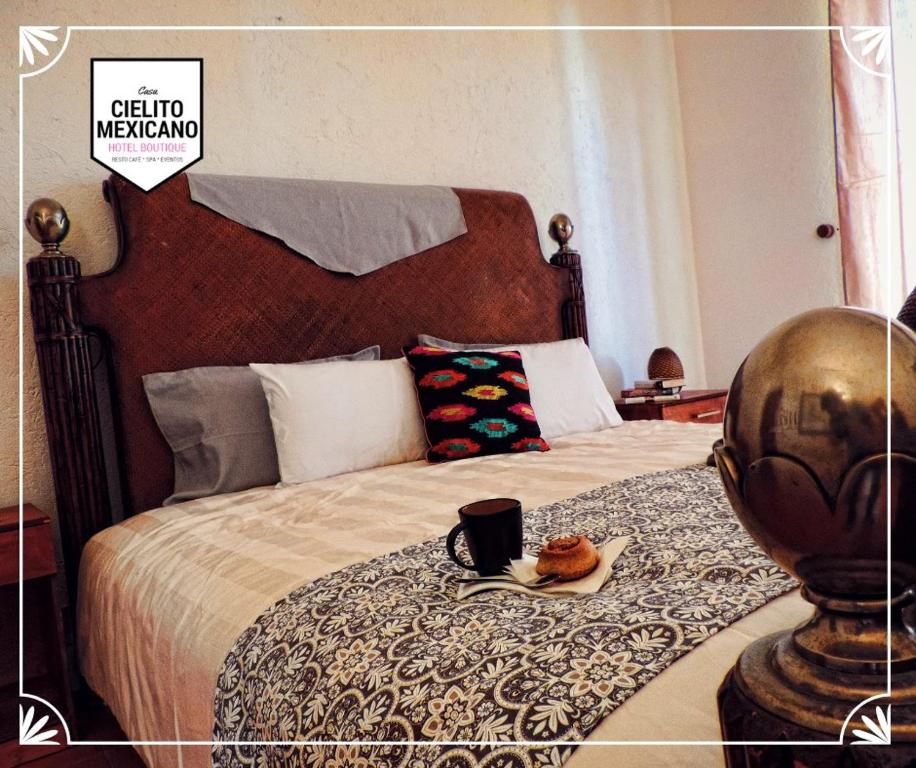 Łóżko lub łóżka w pokoju w obiekcie Casa Cielito Mexicano