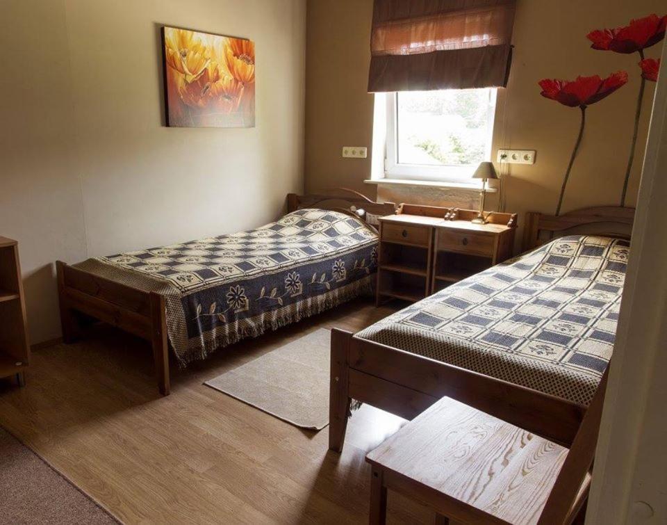 Postel nebo postele na pokoji v ubytování Vahe Guest House