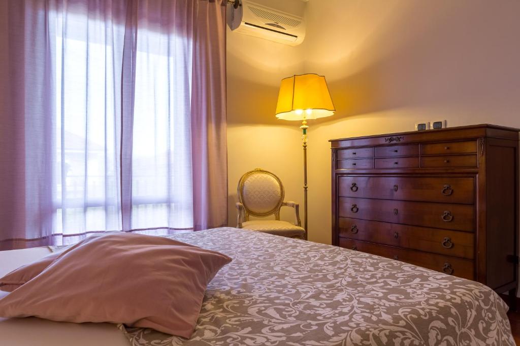 Posteľ alebo postele v izbe v ubytovaní Lillà - Home and Garden