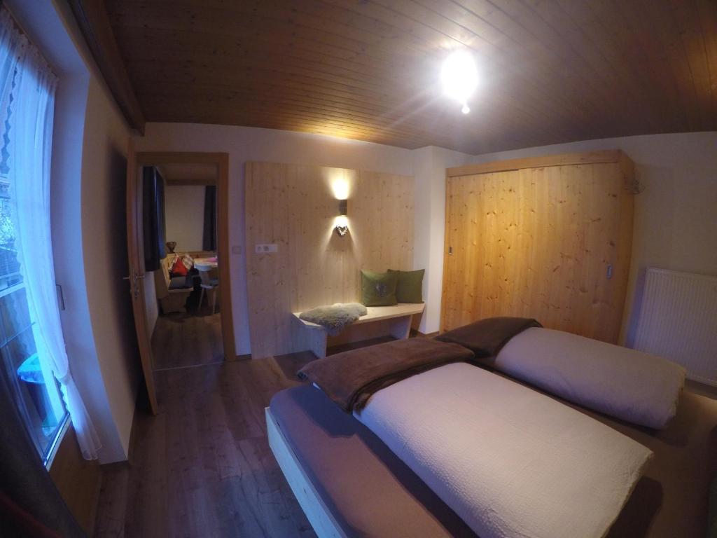 Postel nebo postele na pokoji v ubytování Haus Weitenstich