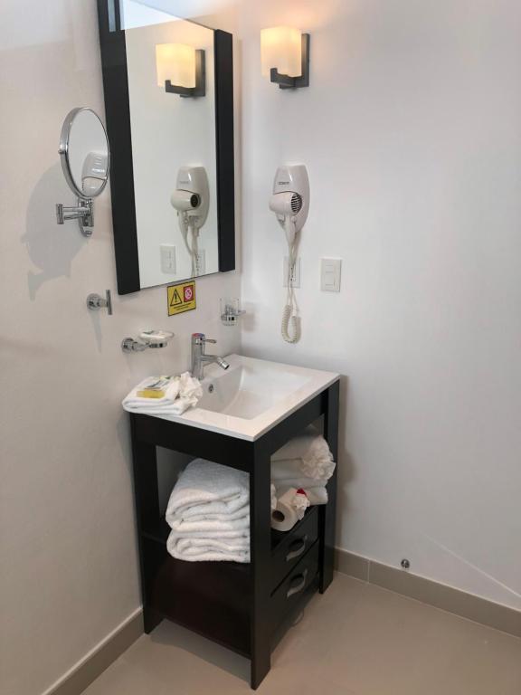 Foto da galeria de Suites Malecon Cancun em Cancún