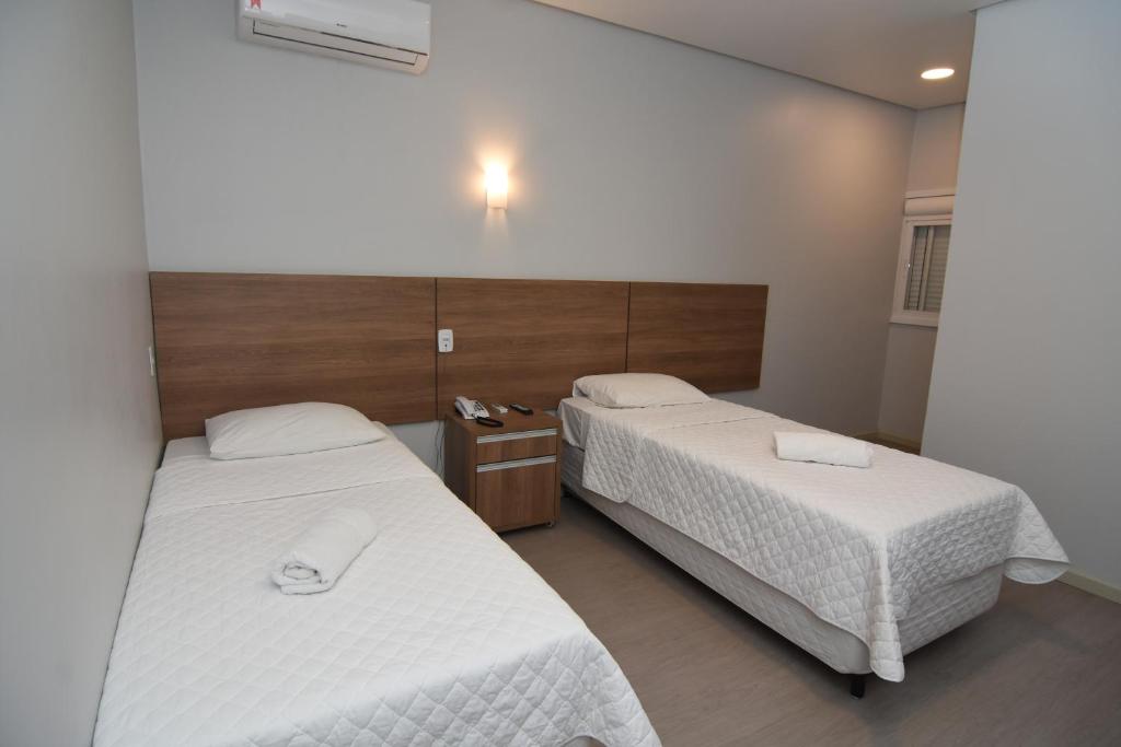 Een bed of bedden in een kamer bij ID Hotel