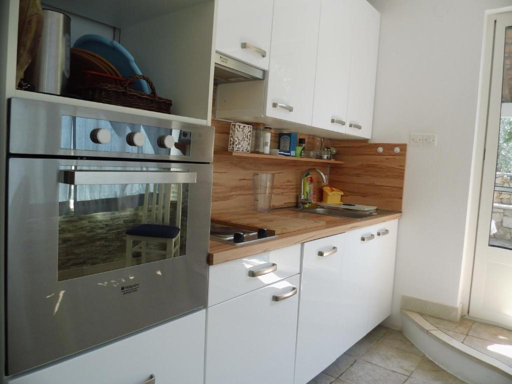 Кухня или мини-кухня в Apartman Šego

