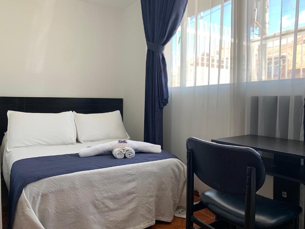 Postel nebo postele na pokoji v ubytování Hotel Casa Guillermo