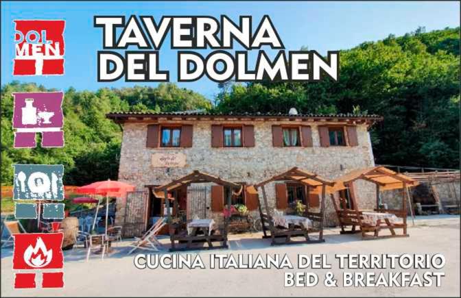 Millesimo的住宿－Taverna del Dolmen，一张建筑物的照片,上面写着“tavernina del domino”