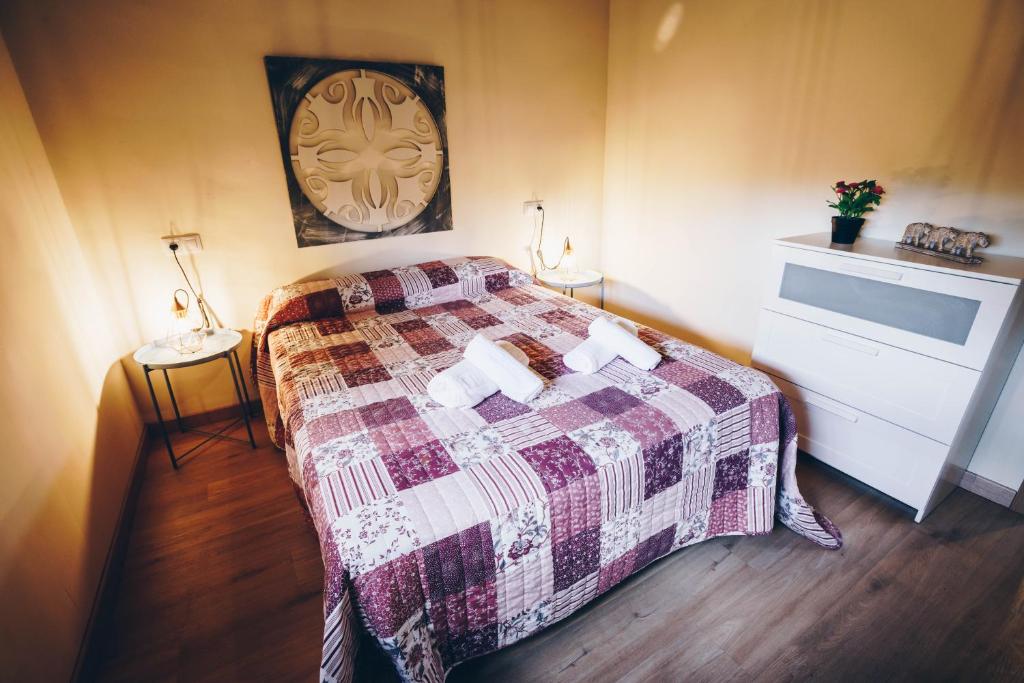 Postel nebo postele na pokoji v ubytování Complejo Roma
