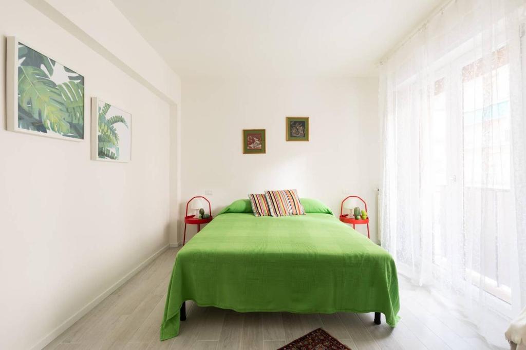 Łóżko lub łóżka w pokoju w obiekcie appartamento Firenze Careggi