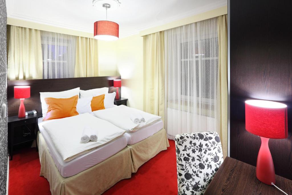 Posteľ alebo postele v izbe v ubytovaní Pytloun Design Self Check-in Hotel