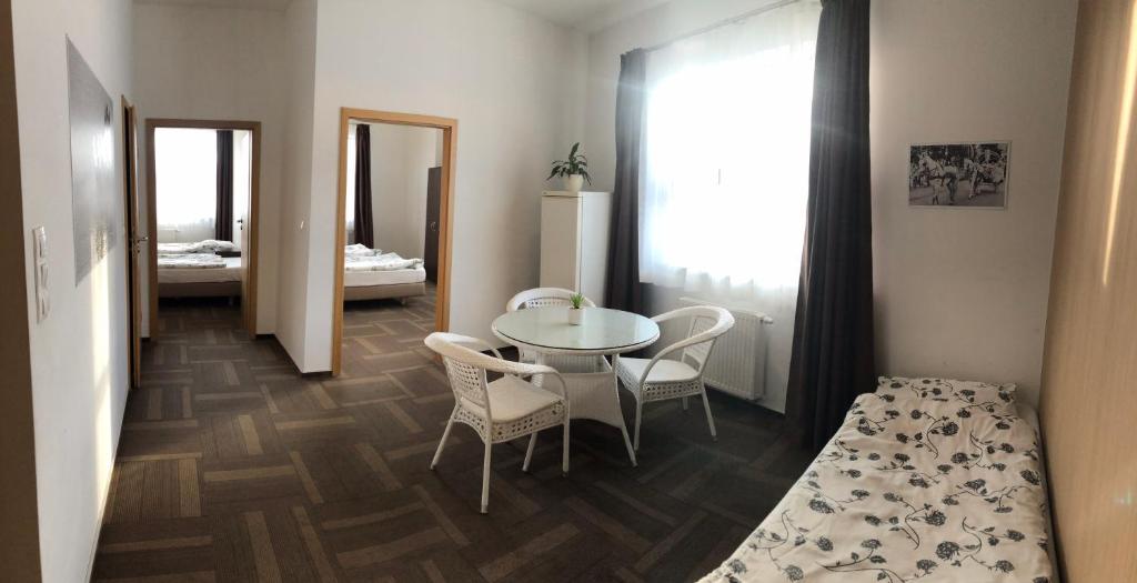Postel nebo postele na pokoji v ubytování Hipodrom Sopot