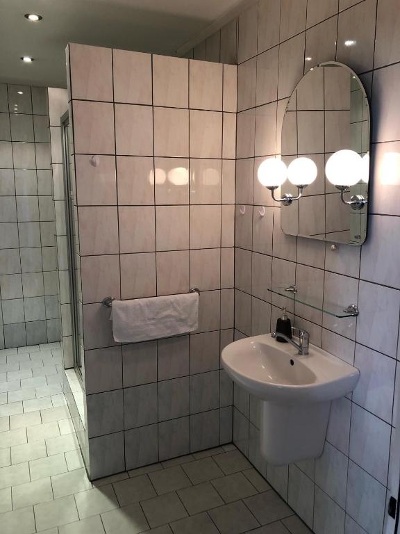Koupelna v ubytování Hotel Piast