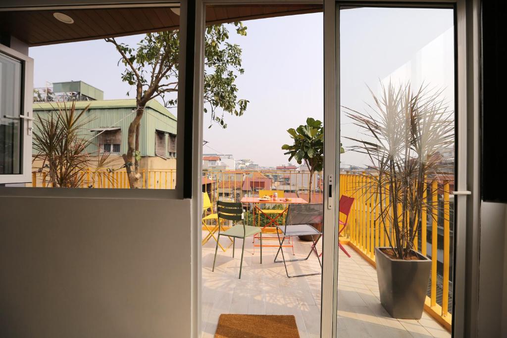 Balkón nebo terasa v ubytování Hanoi Banana Hostel