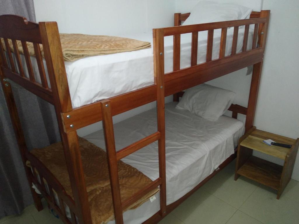 Postel nebo postele na pokoji v ubytování BACHÍG Hospedaje