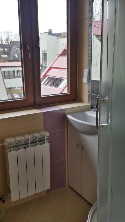 Kuchyňa alebo kuchynka v ubytovaní Willa Chaber