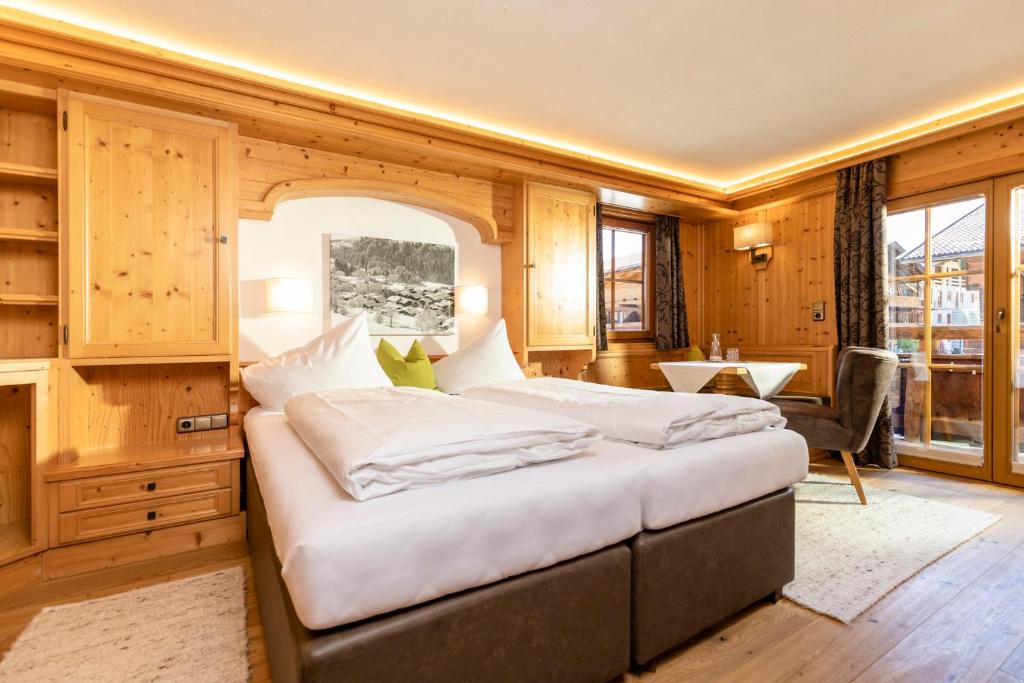 Postel nebo postele na pokoji v ubytování Gästehaus Gratlspitz