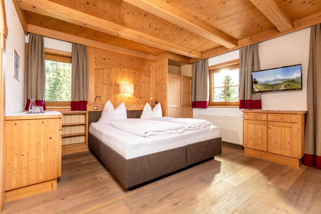 Postel nebo postele na pokoji v ubytování Gästehaus Gratlspitz
