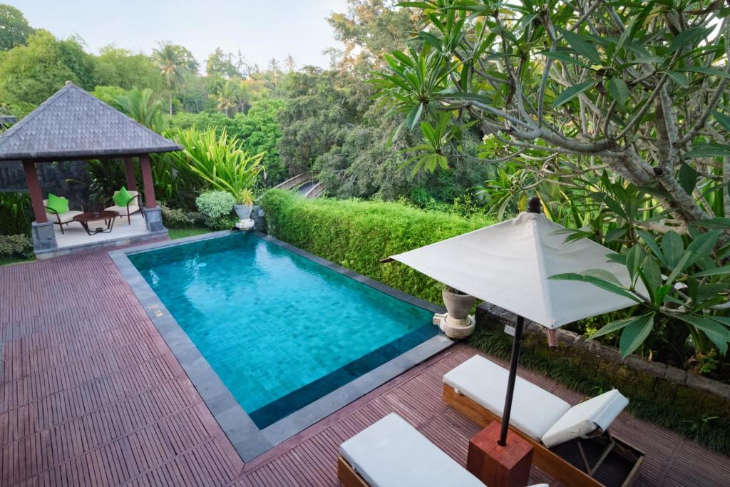 Bazén v ubytování Sanctoo Suites & Villas nebo v jeho okolí