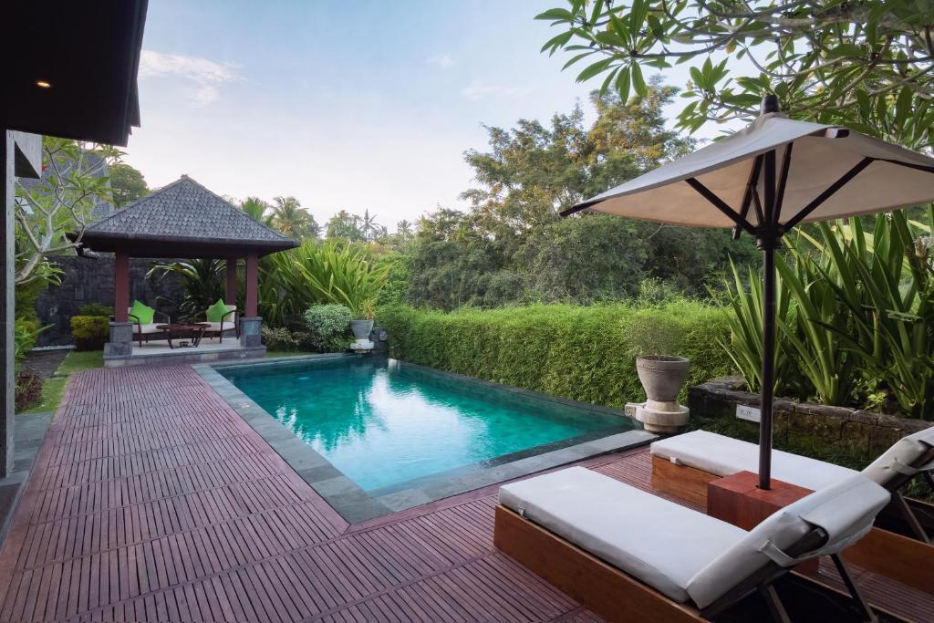 Bazén v ubytování Sanctoo Suites & Villas nebo v jeho okolí