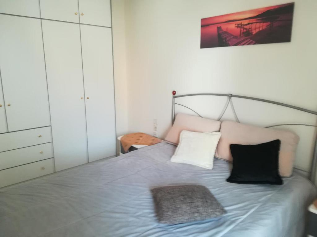 Postel nebo postele na pokoji v ubytování 2nd Floor Apartment In Volos