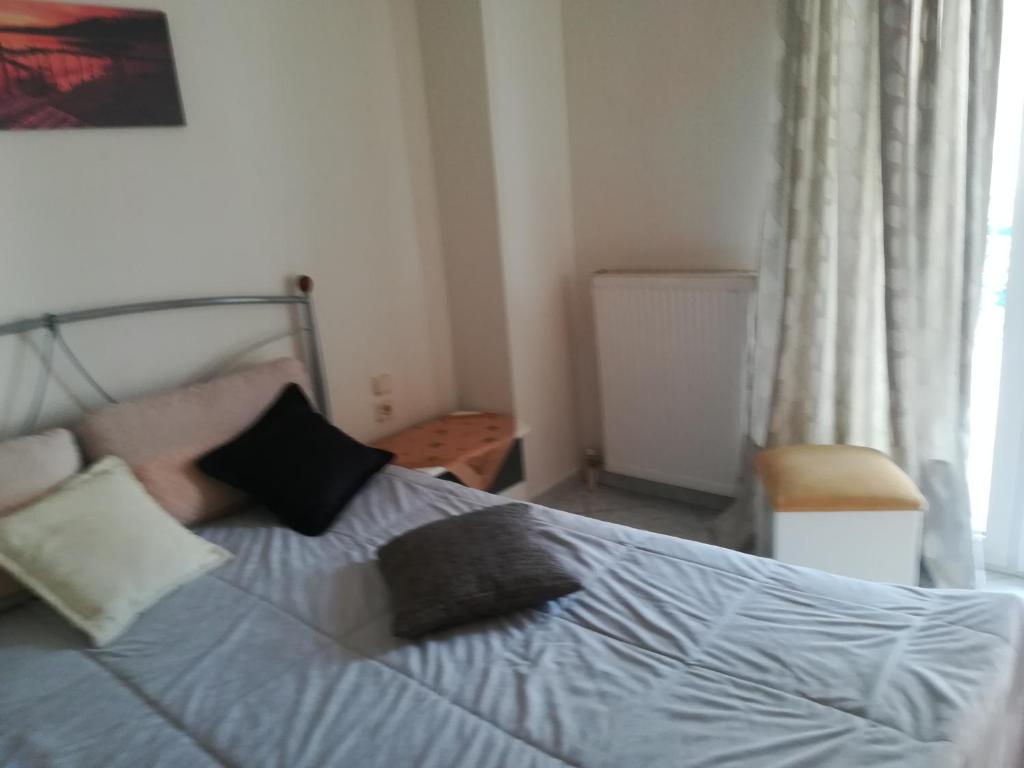 Postel nebo postele na pokoji v ubytování 2nd Floor Apartment In Volos