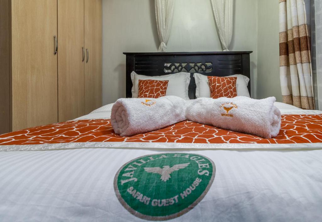 Postel nebo postele na pokoji v ubytování Javilla Eagles Safari Guest house