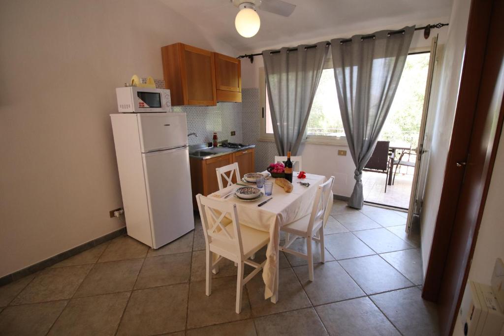 Kuchnia lub aneks kuchenny w obiekcie Cala Dell'Arena
