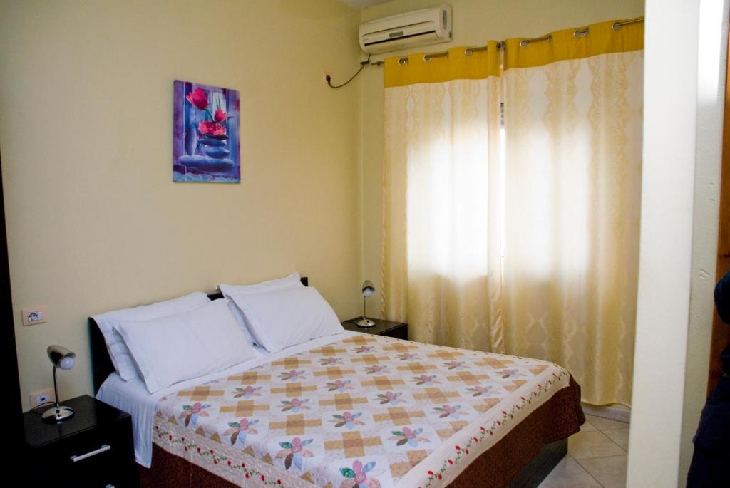 Postel nebo postele na pokoji v ubytování Hotel 4 Stinet