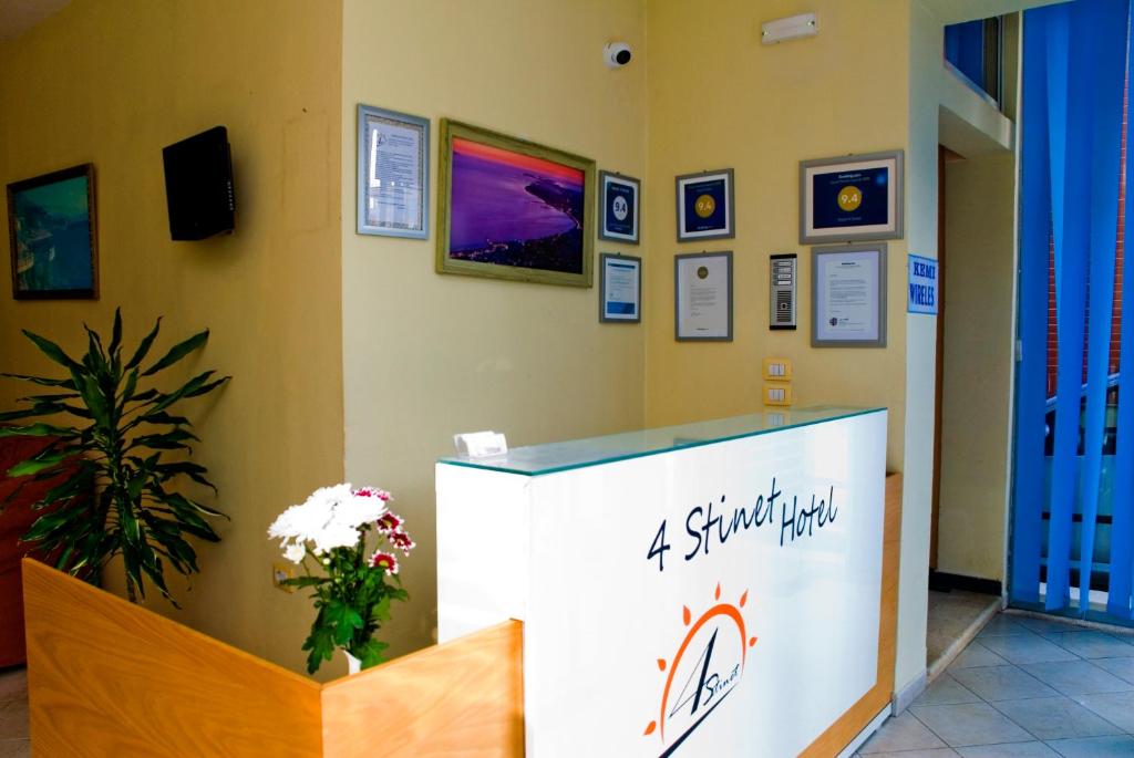 TV a/nebo společenská místnost v ubytování Hotel 4 Stinet