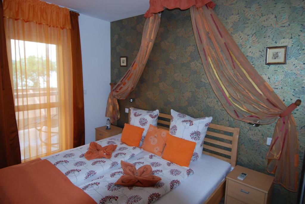Кровать или кровати в номере Soline Bay Seashore Residence
