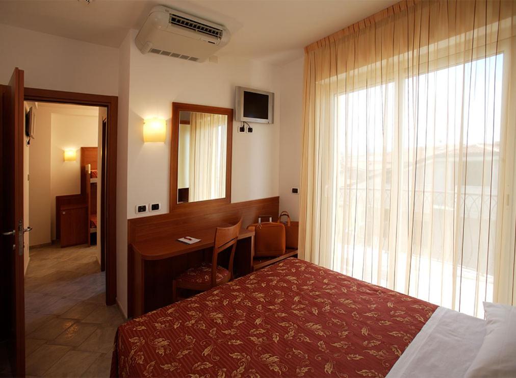 Postel nebo postele na pokoji v ubytování Hotel Boracay