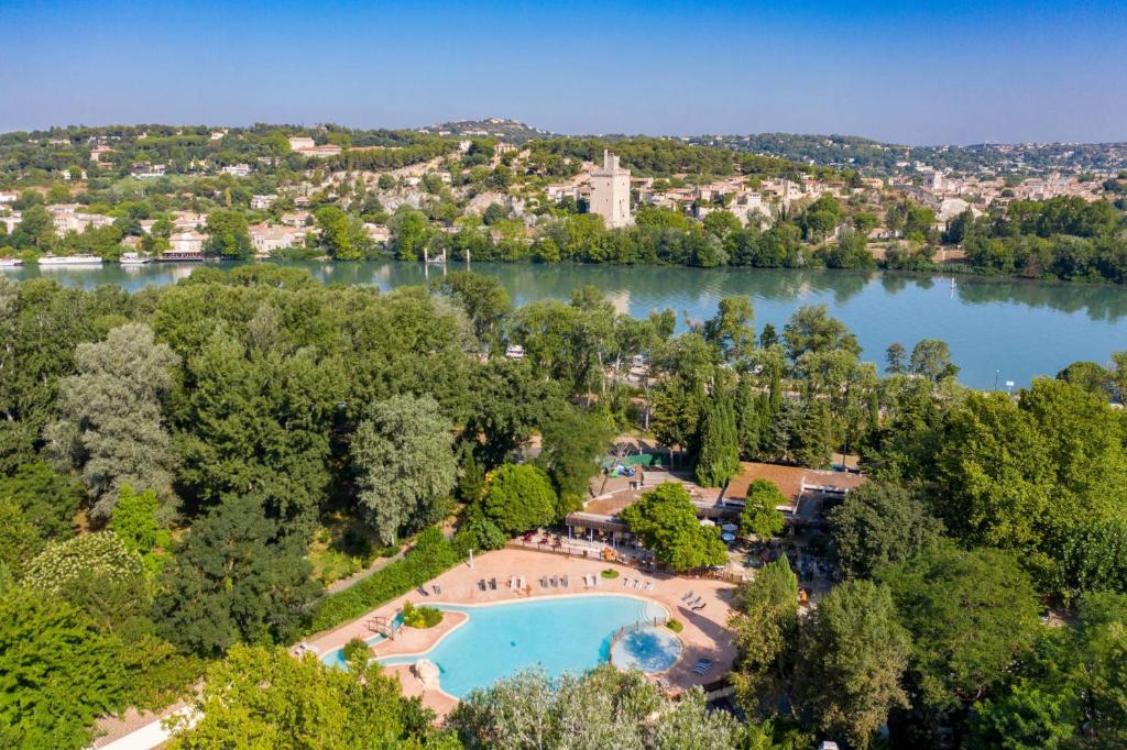 an aerial view of a resort on a lake at Camping du Pont d'Avignon in Avignon