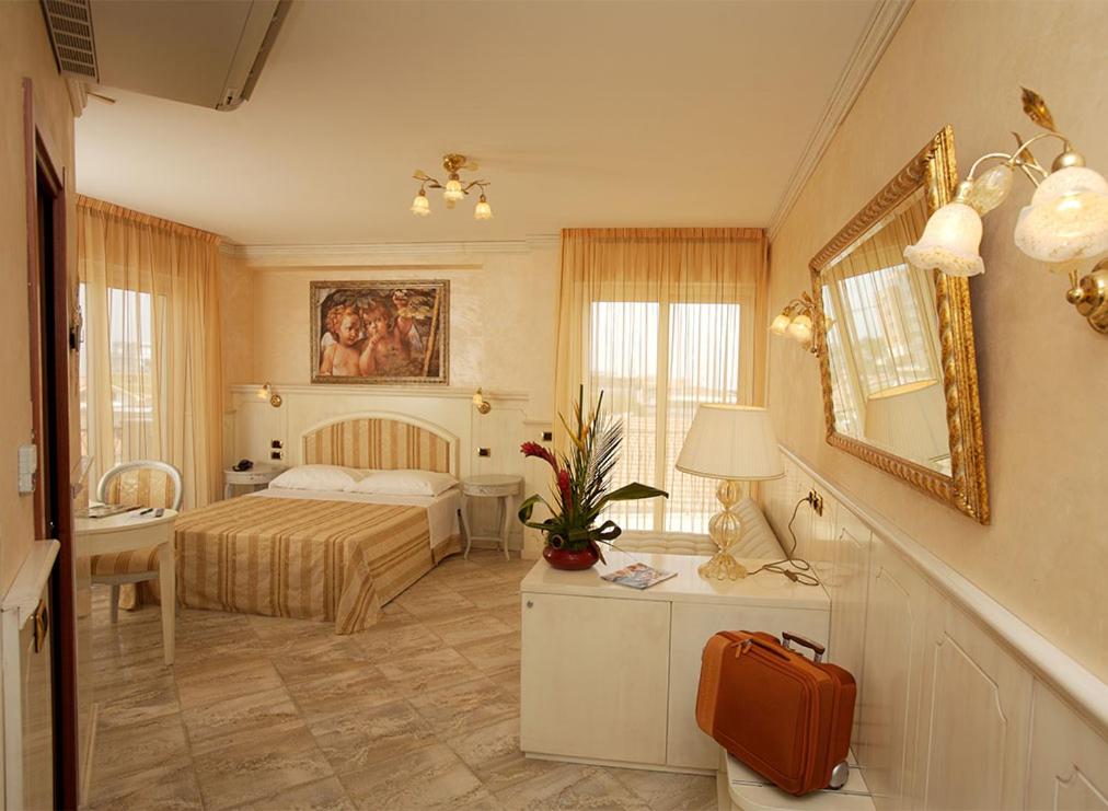 Postel nebo postele na pokoji v ubytování Hotel Boracay
