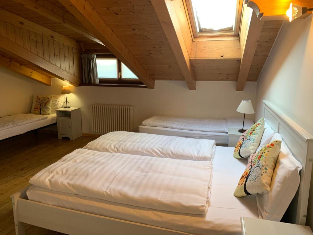 Postel nebo postele na pokoji v ubytování Hotel Pezzotti