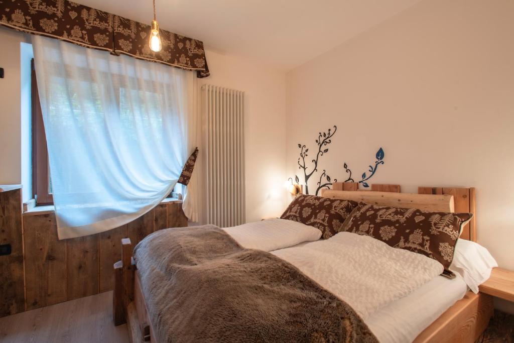 Postel nebo postele na pokoji v ubytování Hotel Pezzotti