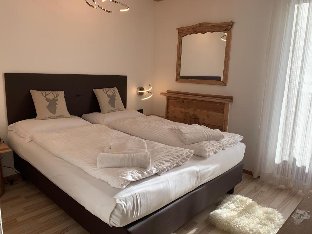 Postel nebo postele na pokoji v ubytování Hotel Pezzotti