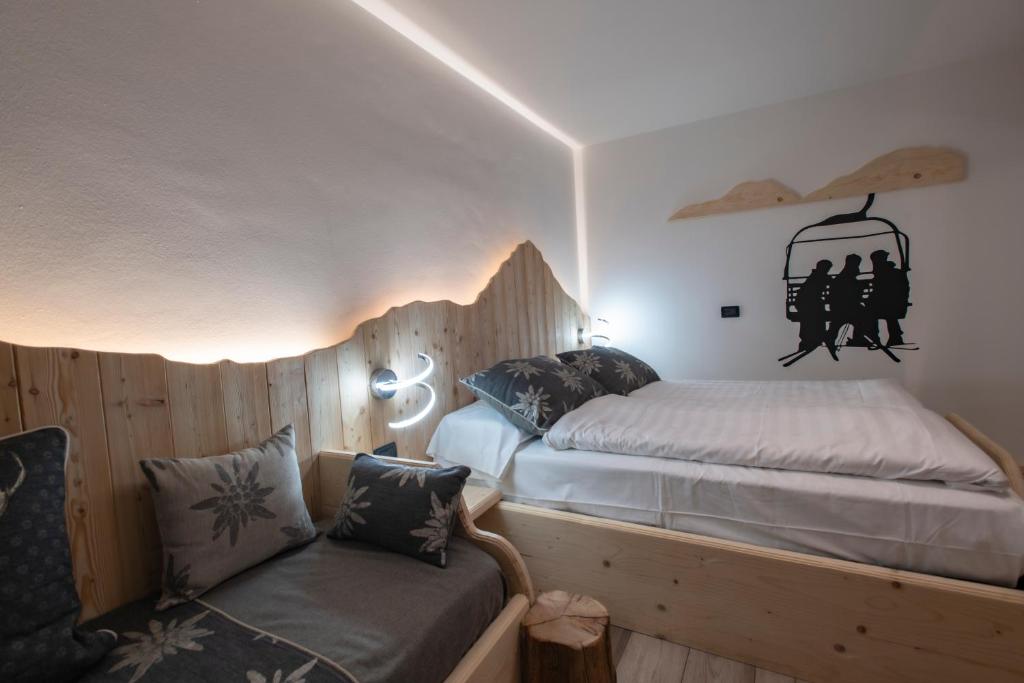 Postel nebo postele na pokoji v ubytování Hotel Pezzotti