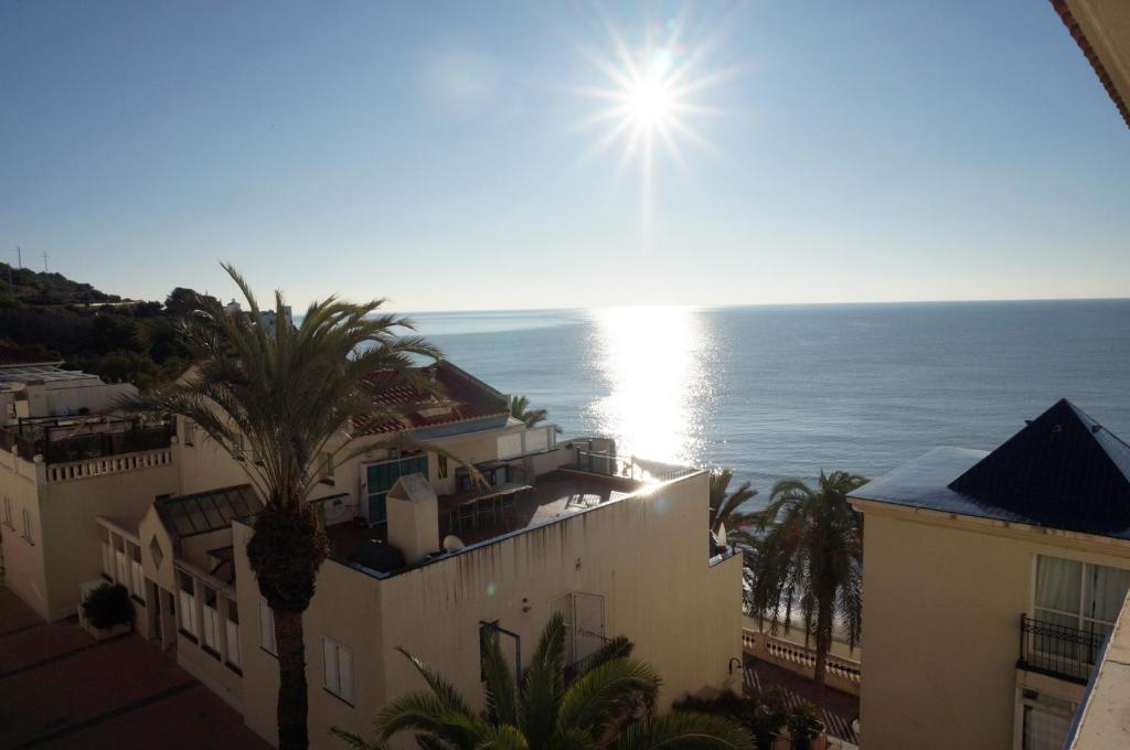 a view of the ocean from a building at La Marina SeaView Penthouse in Sitges