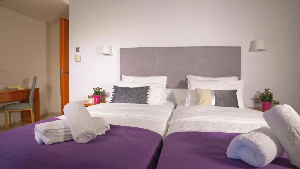 Postel nebo postele na pokoji v ubytování Antikyra Beach Hotel