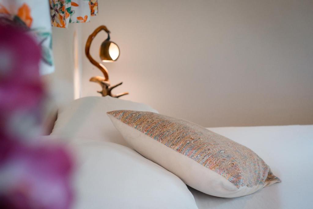 Postel nebo postele na pokoji v ubytování Kallpa B&B