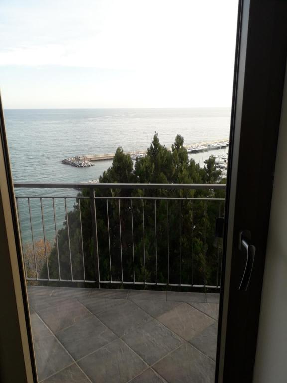 a view from the door of the ocean at B&B nido sul mare in Alassio