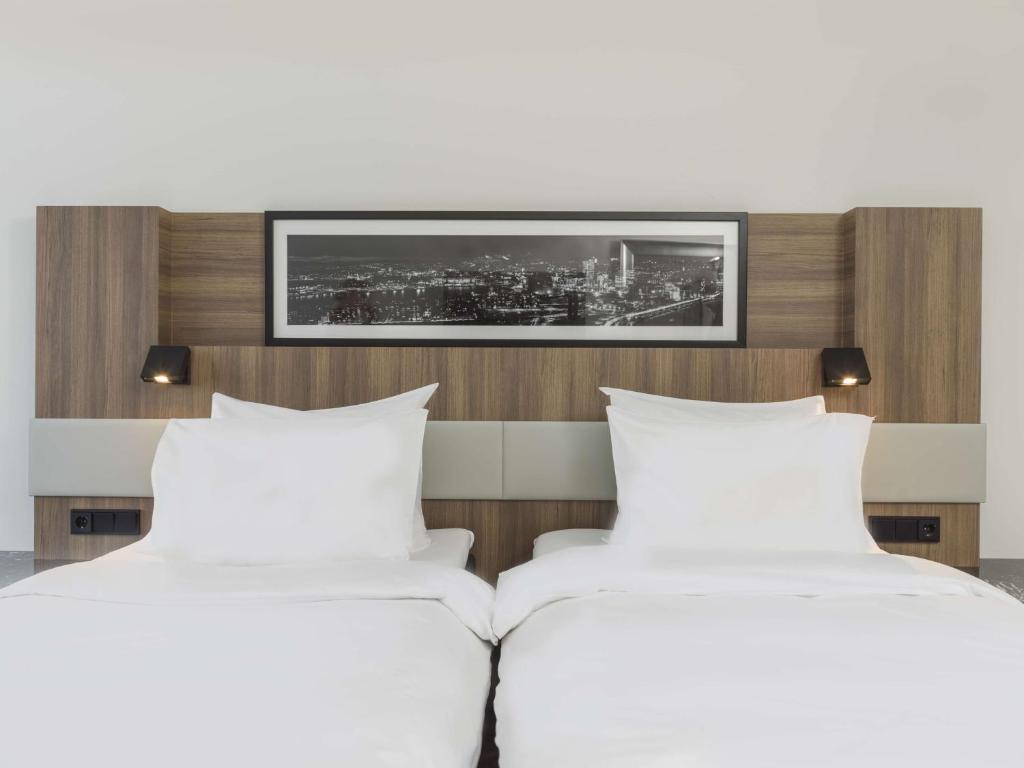 Postel nebo postele na pokoji v ubytování Radisson Blu Hotel Nydalen, Oslo