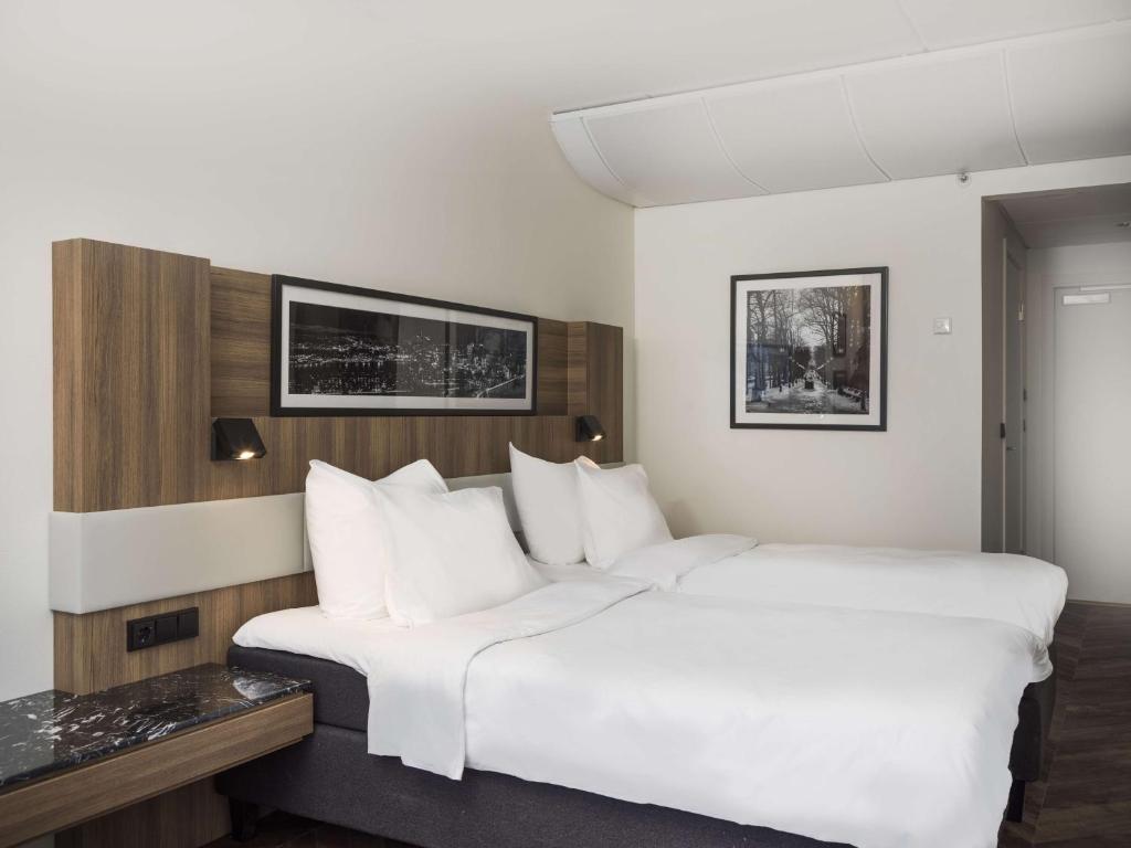 Postel nebo postele na pokoji v ubytování Radisson Blu Hotel Nydalen, Oslo