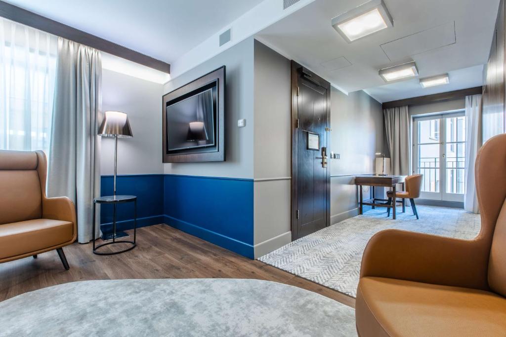TV a/nebo společenská místnost v ubytování Radisson Blu Hotel Prague