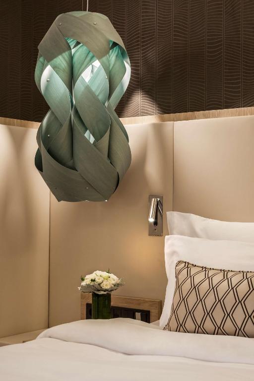 Postel nebo postele na pokoji v ubytování Radisson Blu Béke Hotel, Budapest