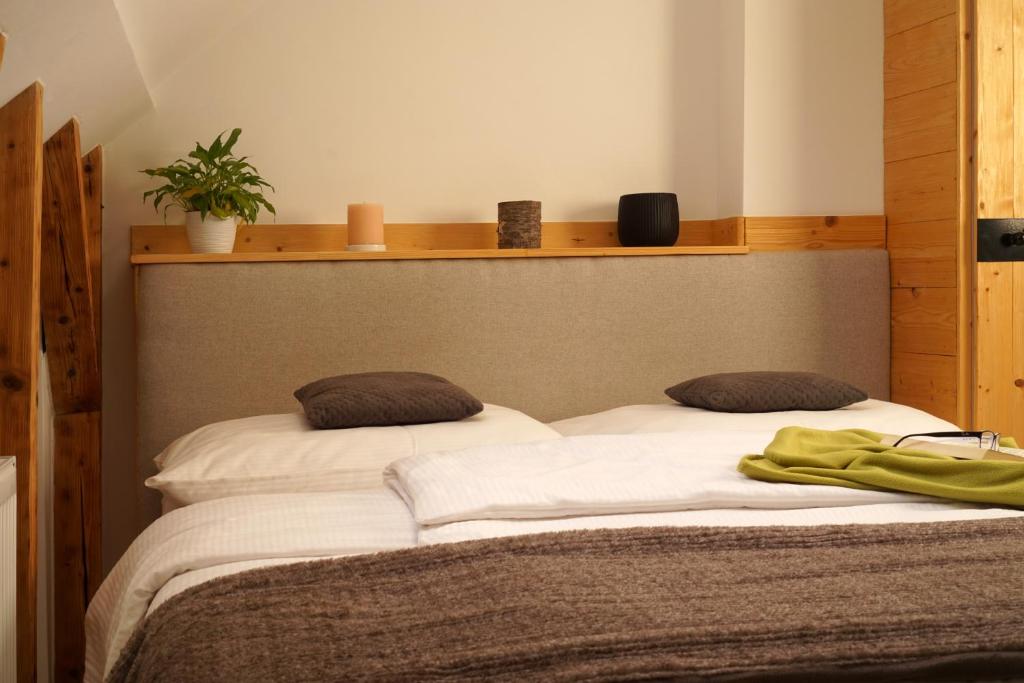 Posteľ alebo postele v izbe v ubytovaní Kamienica Na Nowo Apartamenty
