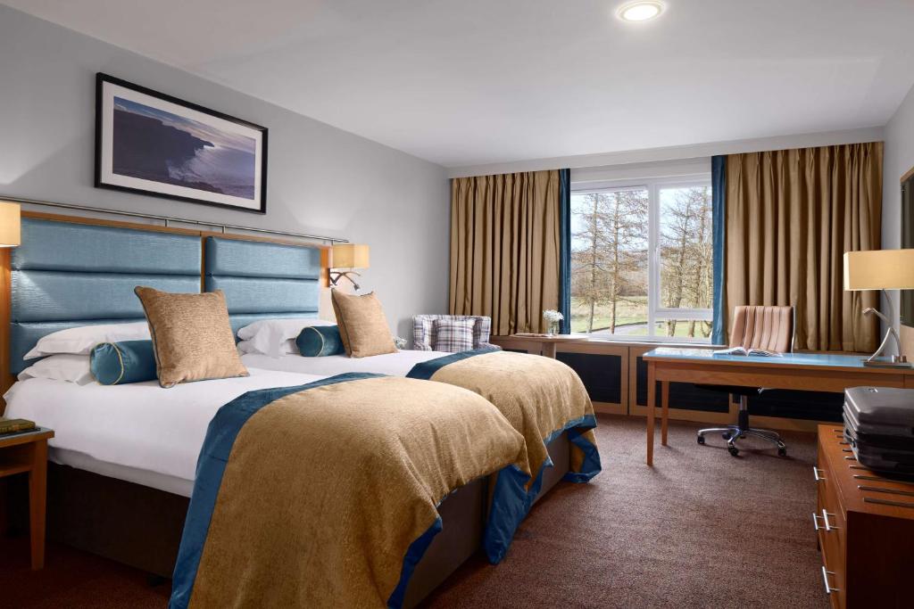 Ένα ή περισσότερα κρεβάτια σε δωμάτιο στο Radisson BLU Hotel and Spa, Limerick