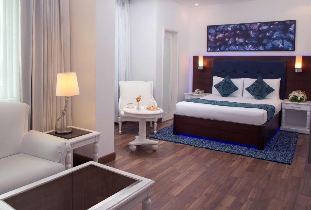 Postel nebo postele na pokoji v ubytování Radisson Blu Kochi
