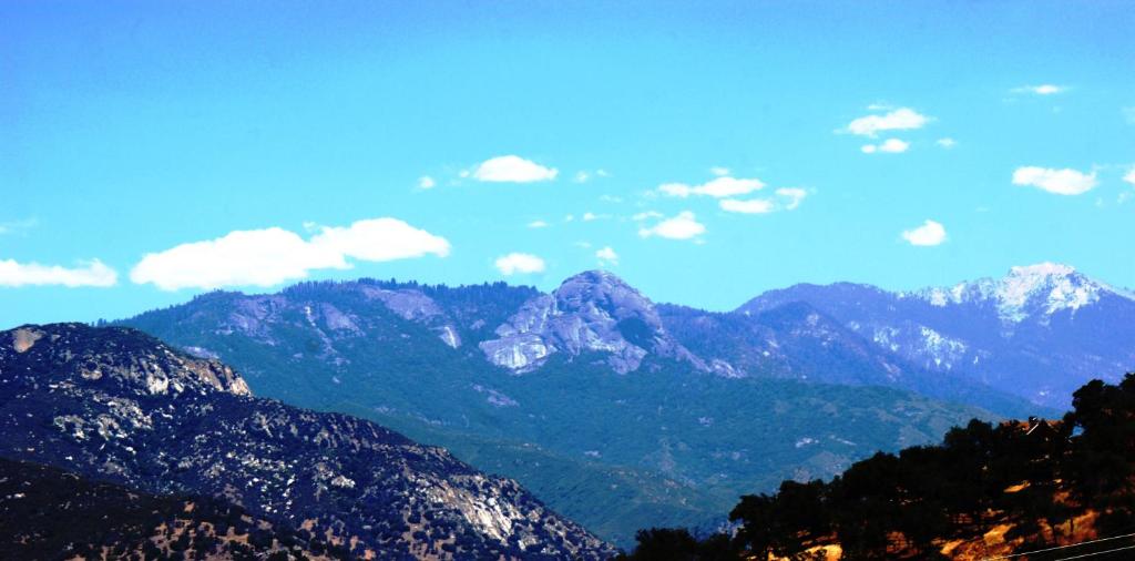 a view of a mountain range with snow capped mountains at Shady Knoll in Three Rivers
