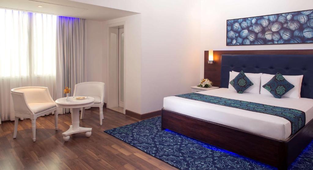 Postel nebo postele na pokoji v ubytování Radisson Blu Kochi