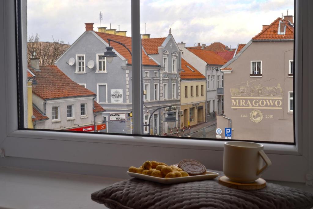 Výhľad na mesto Mrągowo alebo výhľad na mesto priamo z apartmánu